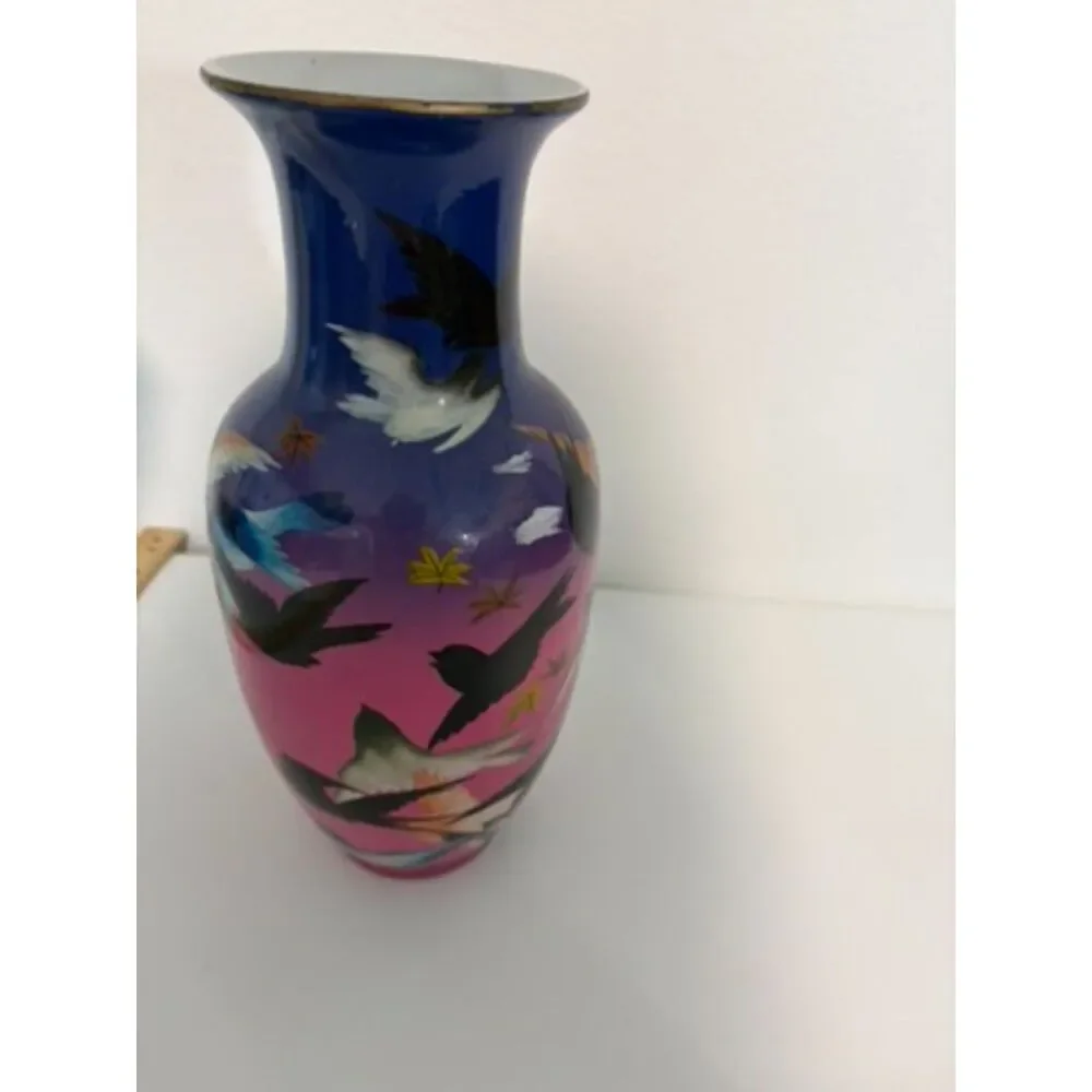 japanese vase with dark blue and pink ground, featuring birds